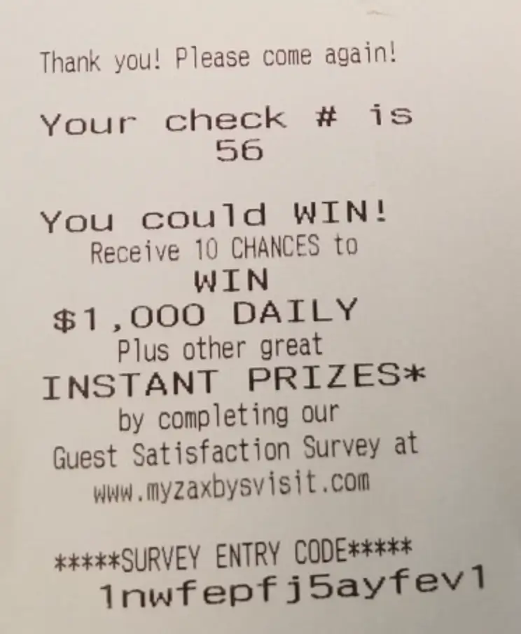 A Zaxby's receipt with the MyZaxbysFeedback survey code and the printed Big Zax Snak offer